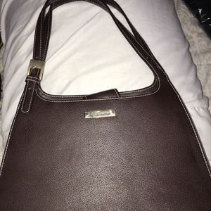 Liz Claiborne brown purse. Never used. No damages